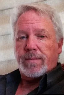 Генри Такер